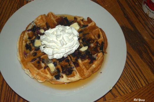 Blueberry and Bacon Waffle with Whipped Cream and fresh Maple Syrup