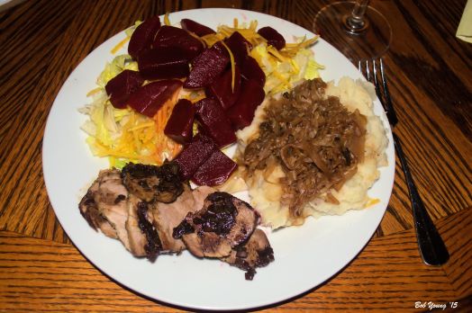 Roasted Pork Medallions Green Salad with Carrot Strings and Pickled Beets Mashed Potatoes and Housemade Sauerkraut 